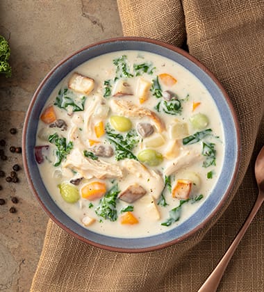 Image of hearty vegetable & turkey soup made with campbell’s® healthy request® cream of mushroom soup