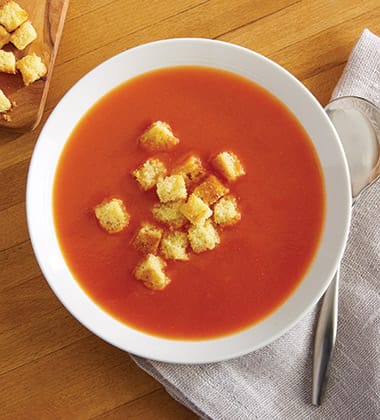 Delicious recipes on campbellsfoodservice.com - tomato soup with cornbread croutons made with campbell’s® condensed tomato soup