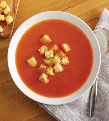 tomato soup with cornbread croutons made with campbell’s® condensed tomato soup