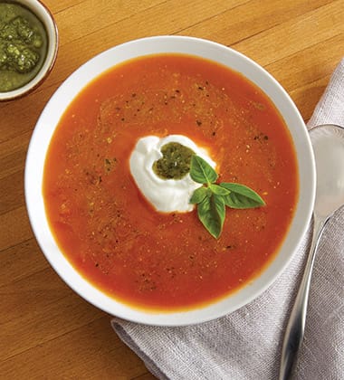 tomato basil pesto soup made with campbell’s® condensed tomato soup