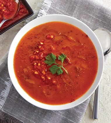 smokey roasted tomato & harissa soup made with campbell’s® condensed tomato soup