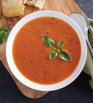 “CREAMY” TOMATO BASIL SOUP MADE WITH CAMPBELL’S® CONDENSED TOMATO SOUP