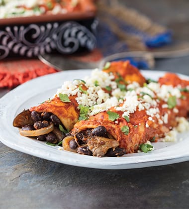 black bean & oyster mushroom enchiladas made with v8® spicy hot vegetable juice featured image