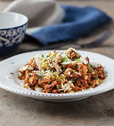 chicken chilaquiles with spicy tomato sauce made with v8® spicy hot vegetable juice featured image
