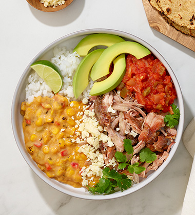mexican street corn carnitas bowl featured image