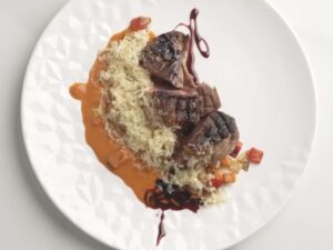 Blackened Duck Breast made with Campbell’s® Culinary Reserve Roasted Red Pepper and Smoked Gouda Soup