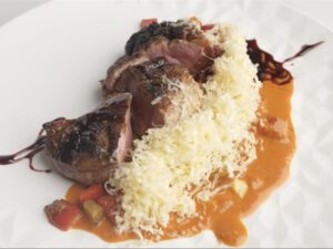 Blackened Duck Breast made with Campbell’s® Culinary Reserve Roasted Red Pepper and Smoked Gouda Soup