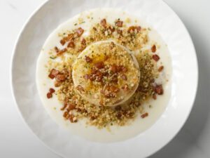 Stuffed Onion Topped With Bacon and Breadcrumbs made with Campbell’s® Culinary Reserve Aged White Cheddar & Cauliflower Bisque