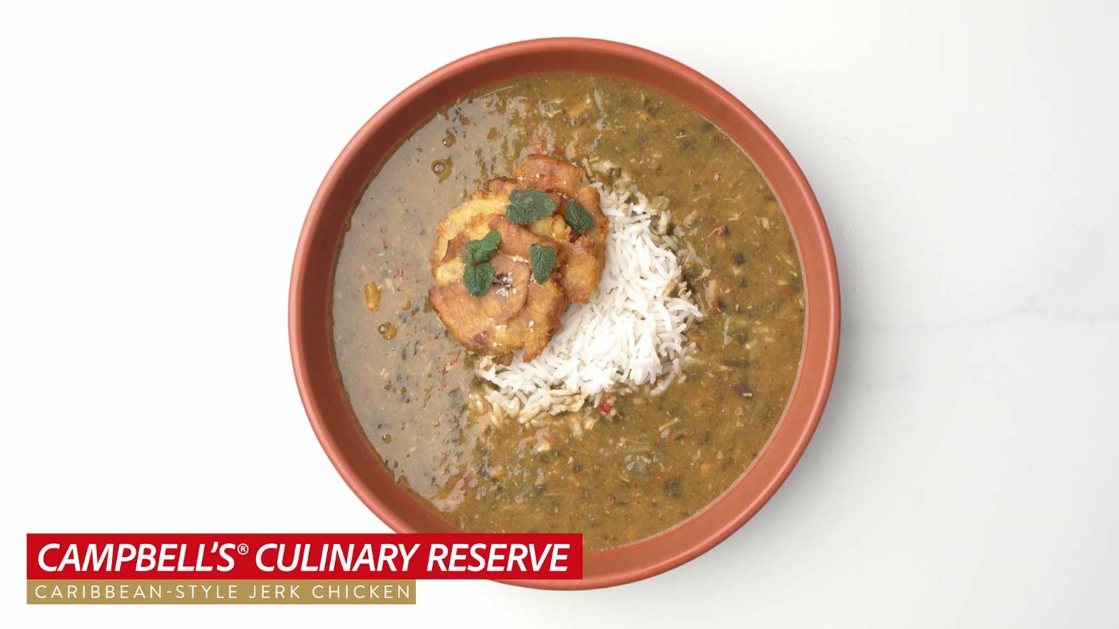 <em>Campbell’s® Culinary Reserve</em> Caribbean-Style Jerk Chicken Soup with Coconut Rice and Twice Fried Plantains 