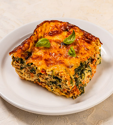 CRUSTLESS TOMATO BASIL QUICHE