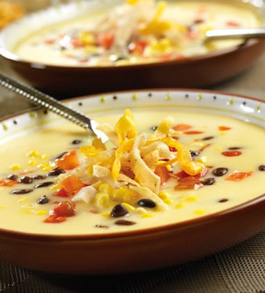 CREAMY CHICKEN TORTILLA SOUP WITH CAMPBELL’S®  CREAM OF CHICKEN SOUP