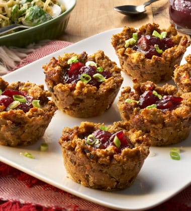 SPICY SAUSAGE STUFFING CUPS WITH GREEN CHILE CRANBERRY SAUCE