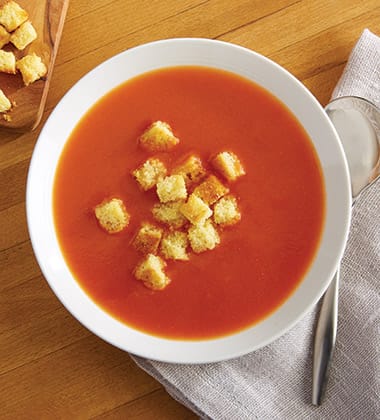 TOMATO SOUP WITH CORNBREAD CROUTONS MADE WITH CAMPBELL’S® CONDENSED TOMATO SOUP