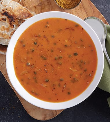 CURRIED LENTIL TOMATO & COCONUT SOUP MADE WITH CAMPBELL’S® CONDENSED TOMATO SOUP