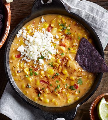 CHEESY MEXICAN STREET CORN DIP MADE WITH CAMPBELL’S RESERVE® MEXICAN STREET CORN