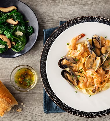 MIXED SEAFOOD FETTUCCINE MADE WITH CAMPBELL’S® RESERVE LOBSTER BISQUE