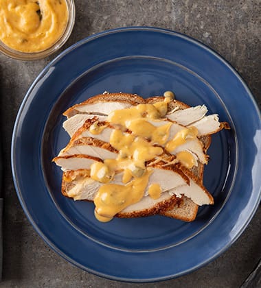 ROASTED POBLANO & WHITE CHEDDAR GRAVY MADE WITH CAMPBELL’S® RESERVE ROASTED POBLANO & WHITE CHEDDAR