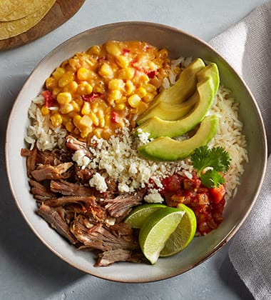 MEXICAN STREET CORN CARNITAS BOWL MADE WITH CAMPBELL’S RESERVE® MEXICAN STREET CORN